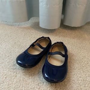 Girl’s patent navy flats